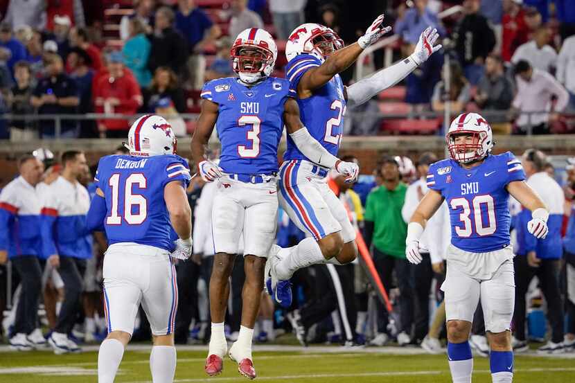 SMU wide receiver James Proche (3) celebrates with safety Rodney Clemons (23) after Proche...