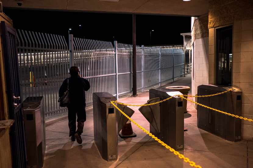 A traveler walked past the entrance to the Paso Del Norte Port of Entry in El Paso on the...