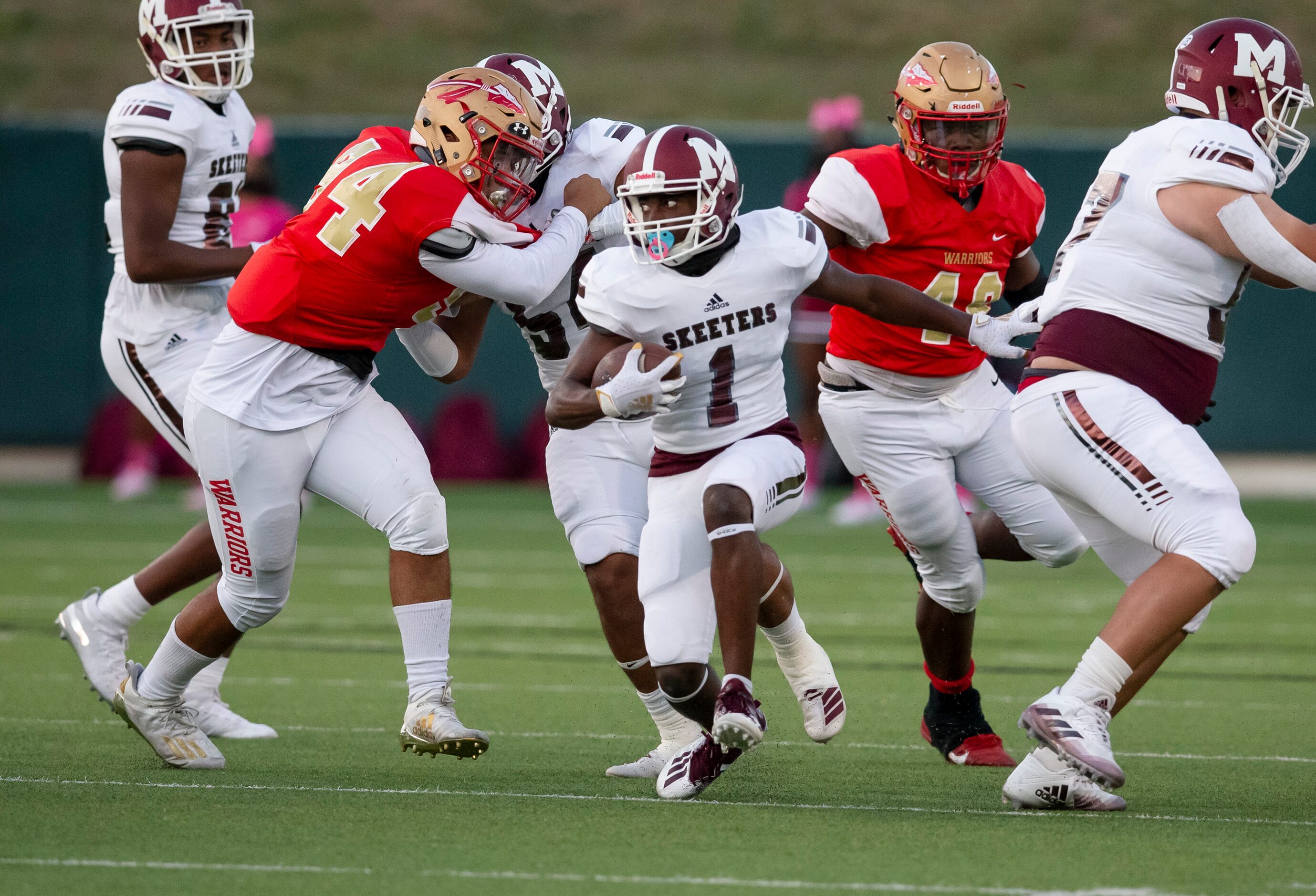 Mesquite junior wide receiver Justin White (1) carries the ball during the first half of a...