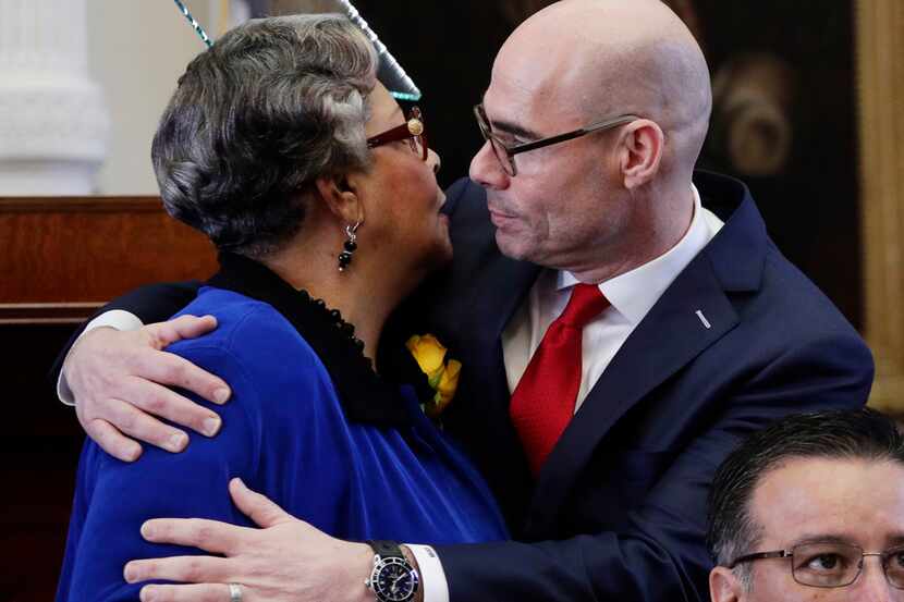 Texas Rep. Senfronia Thompson, D-Houston, left, hugs Rep. Dennis Bonnen, R-Angleton, after...