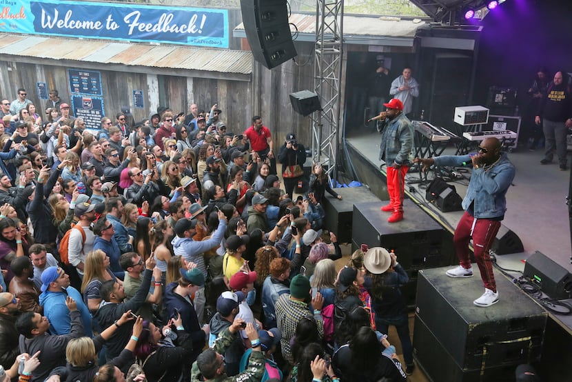 Big Boi, upper right, and Sleepy Brown perform at Rachael Ray's Feedback Party at Stubb's...