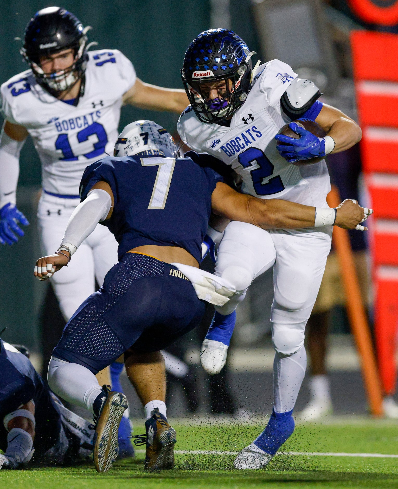 Trophy Club Byron Nelson running back Aaron Darden (2) runs through the arms of Keller...