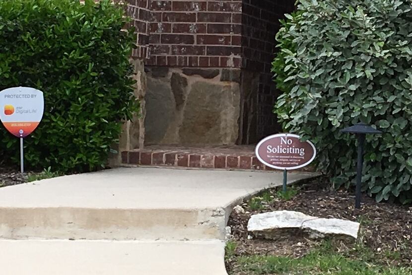 This no soliciting sign was posted at the Frisco home of Radu Chivu, who faces two counts of...