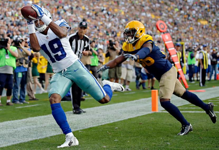 Dallas Cowboys wide receiver Brice Butler (19) stays ahead of Green Bay Packers cornerback...
