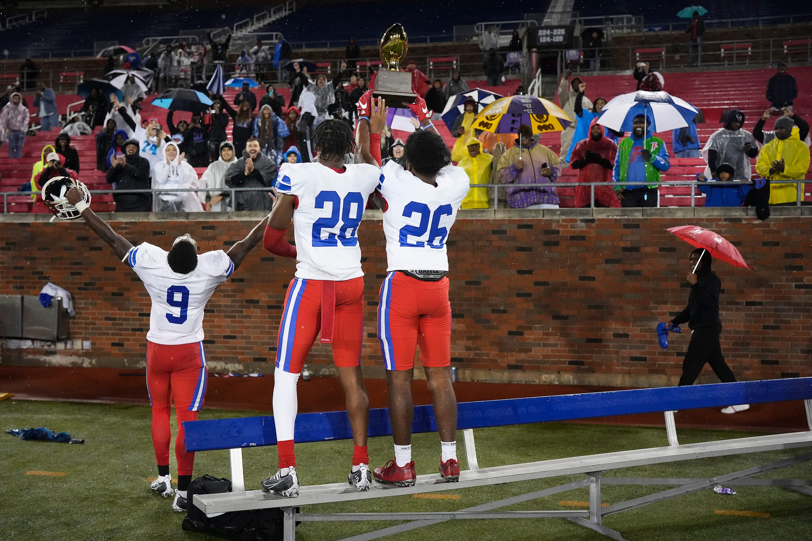 Duncanville defensive back Nick Thompson (26) and defensive back Javion Holiday (28) show...