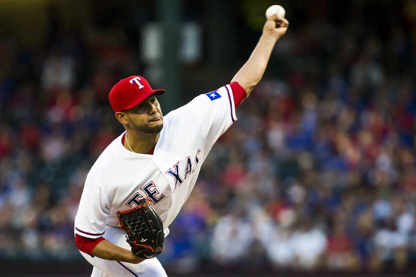 Texas Rangers starting pitcher Martin Perez pitches during the second inning against the New...
