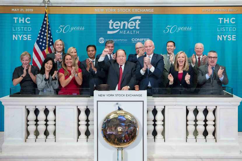 Tenet Healthcare leaders rang the opening bell at the New York Stock Exchange in May 2019. A...