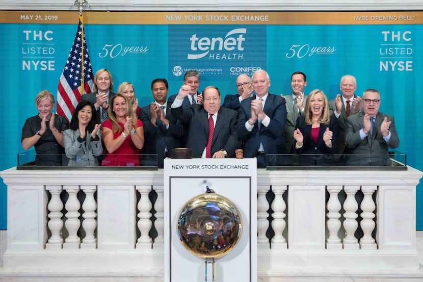 Tenet Healthcare leaders rang the opening bell at the New York Stock Exchange in May 2019. A...