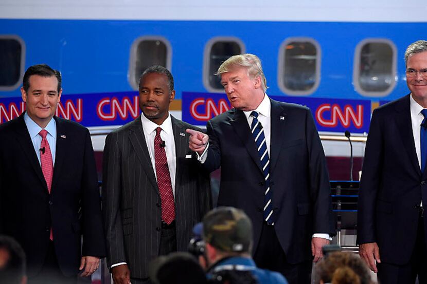 Republican presidential candidates (from left) Sen. Ted Cruz, Ben Carson, Donald Trump, and...