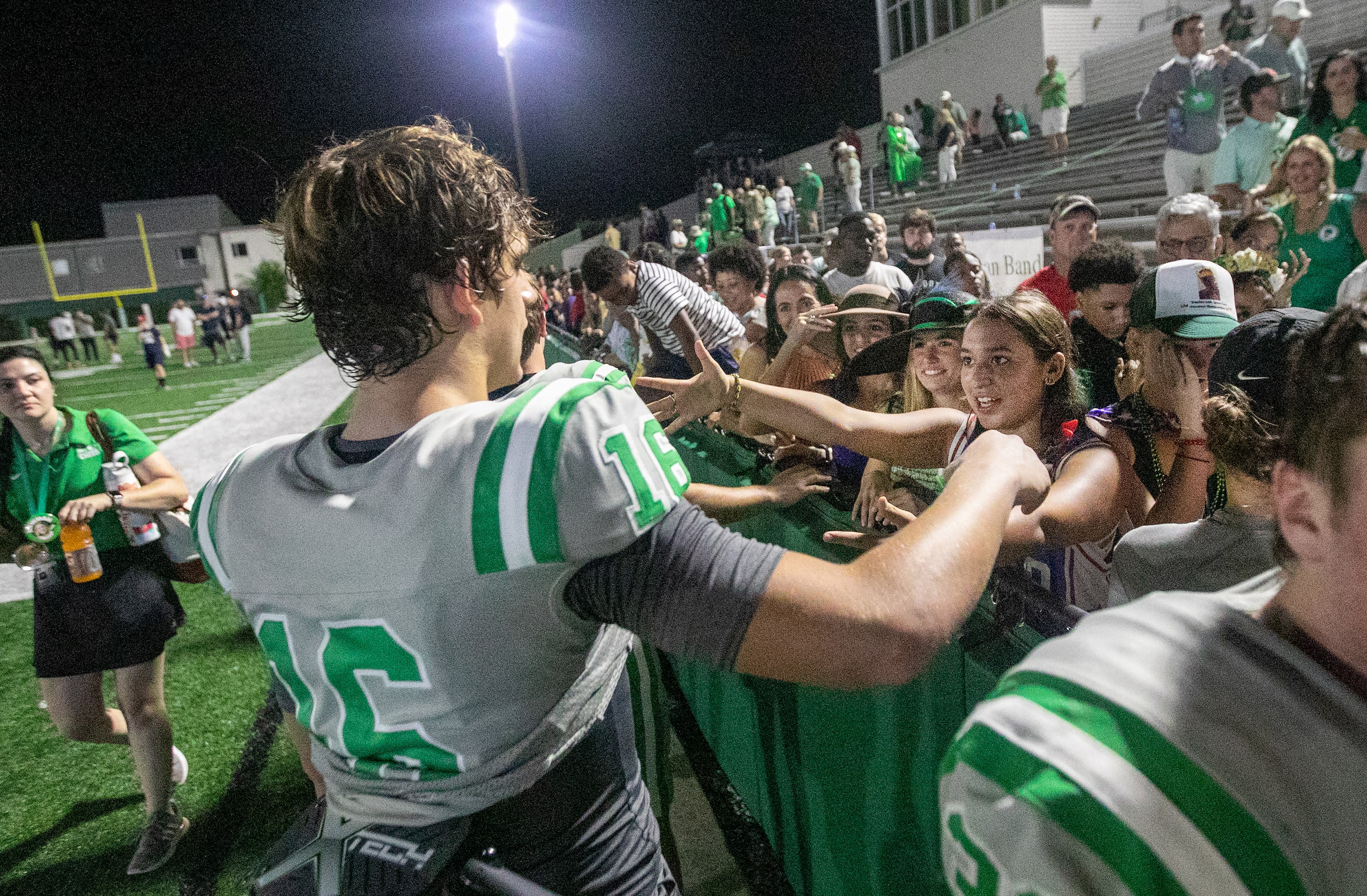 Arch Manning greets his friends and adoring fans after Newman High School defeated Riverside...