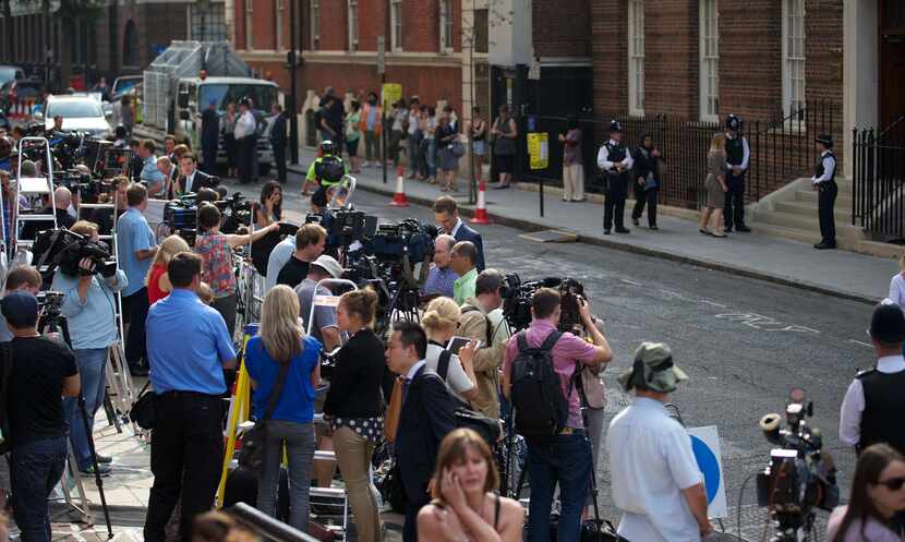 Members of the media gather outside the Lindo Wing of St. Mary's Hospital in west London on...
