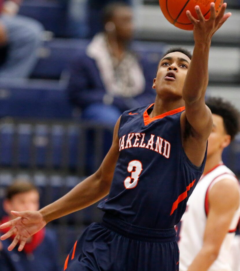 Wakeland gaurd Greg Jones (3) goes in for a lay up during the second quarter as Allen High...