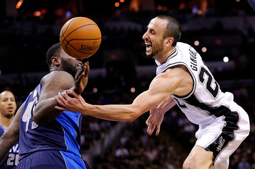 Dallas Mavericks center DeJuan Blair (45) fouls San Antonio Spurs guard Manu Ginobili (20)...