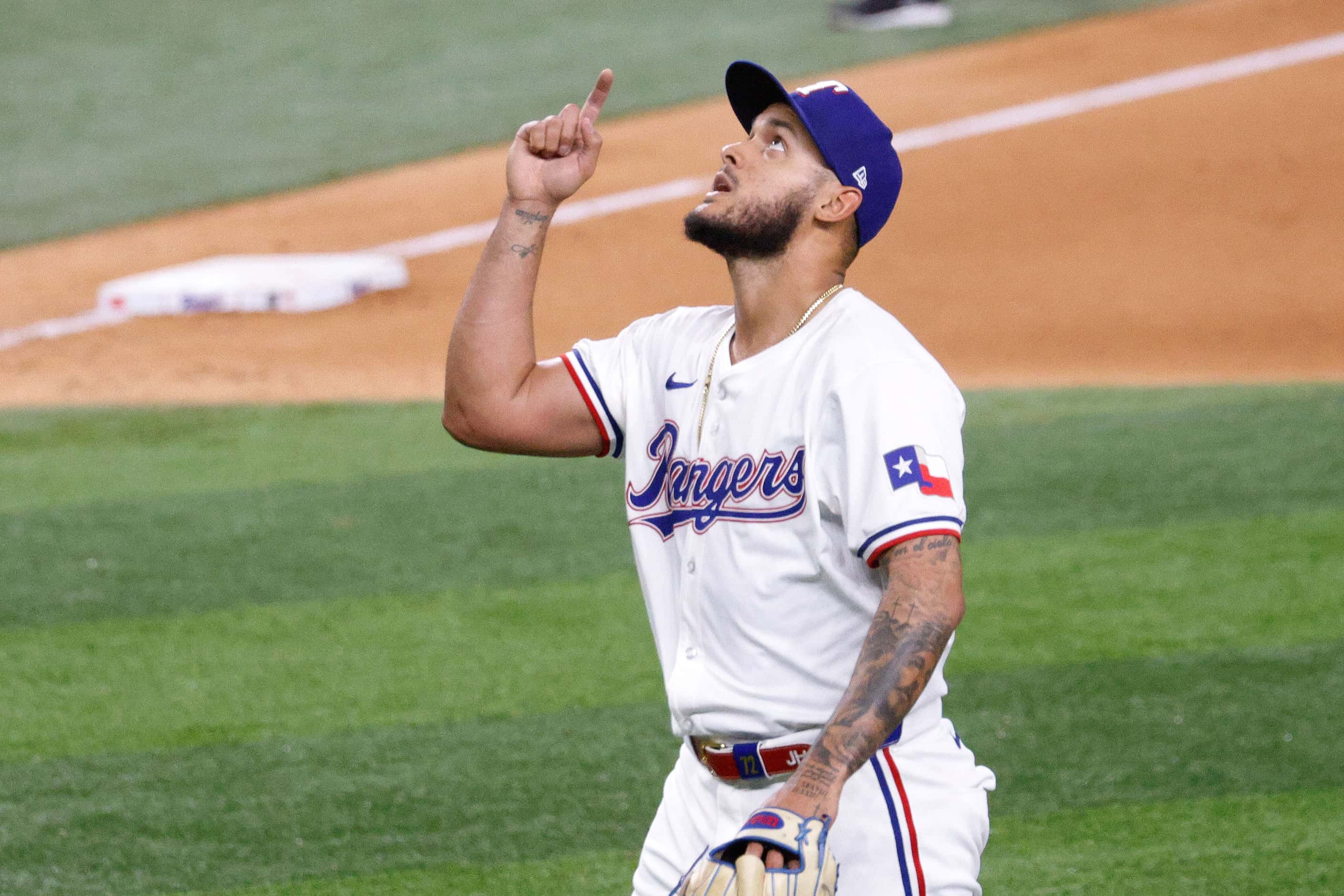 Texas Rangers pitcher Jonathan Hernández (72)  celebrates after a baseball game against the...