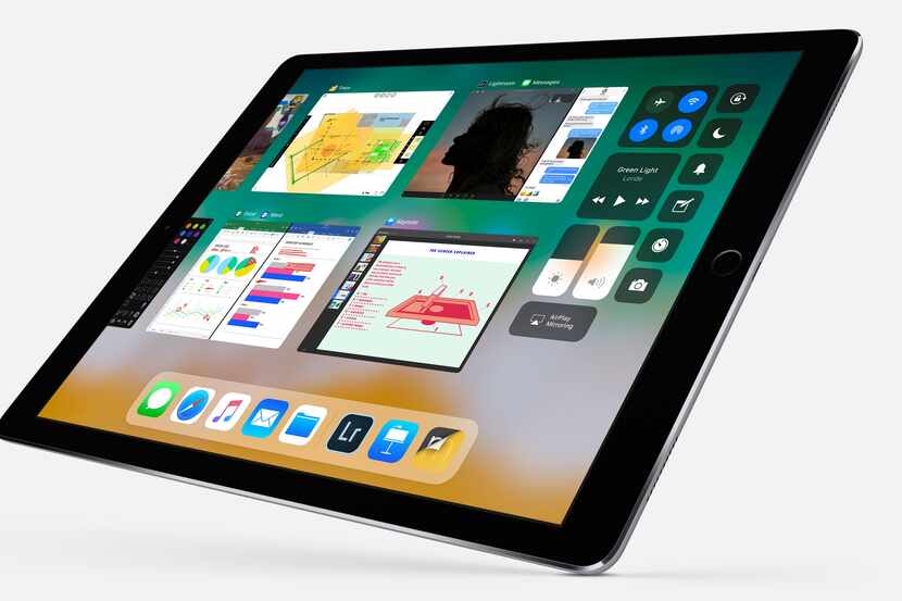 iOS 11, running on an iPad, shows the dock and the new design for the control center.