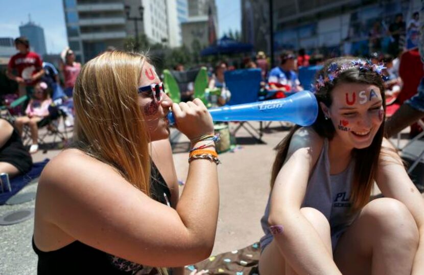 
Astrid Schuelke (left) and Grace Flanagan blew off some World Cup steam at Victory Plaza at...