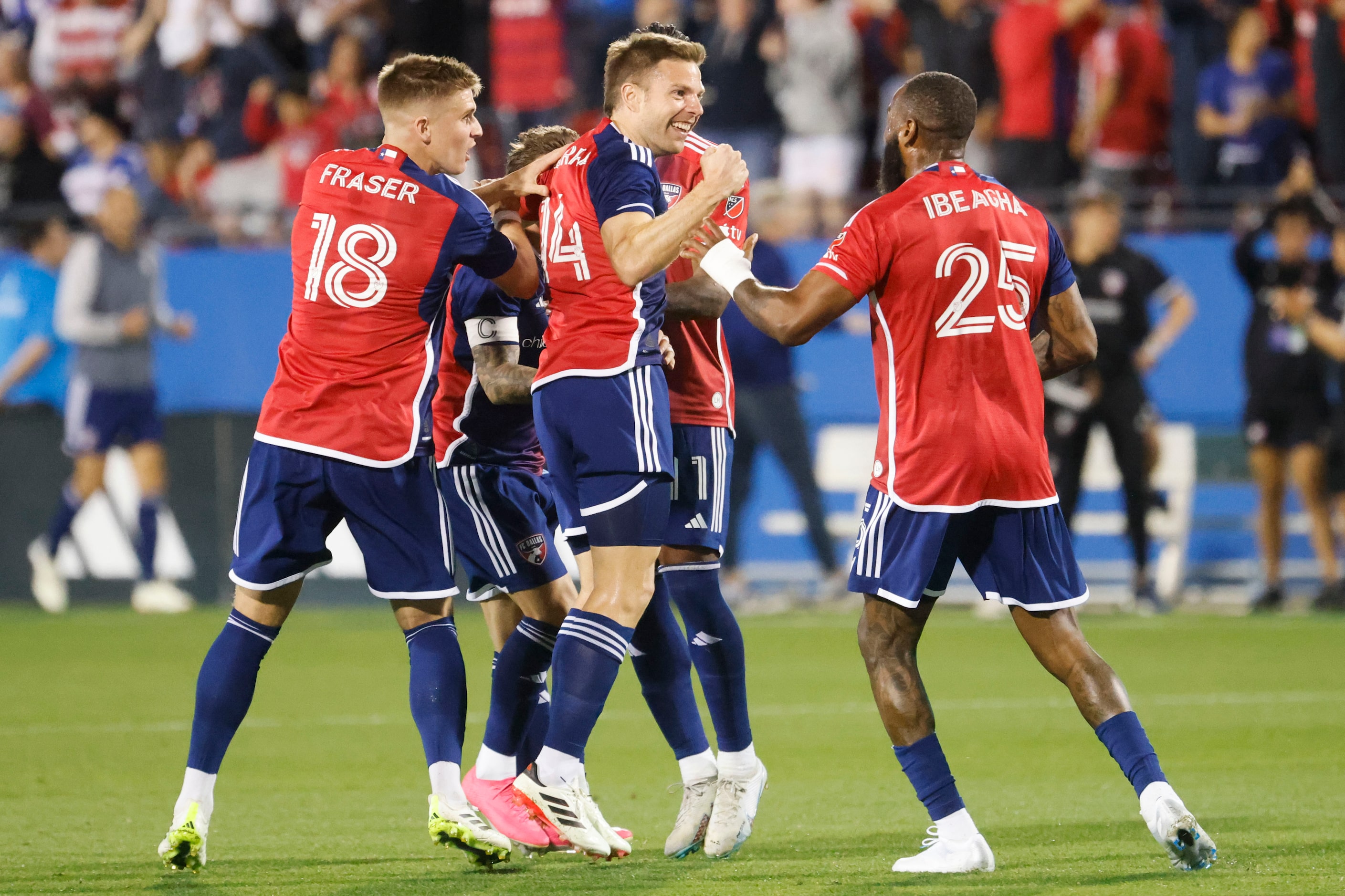 FC Dallas midfielder Asier Illarramendi (center) celebrates his goal with his teammates...