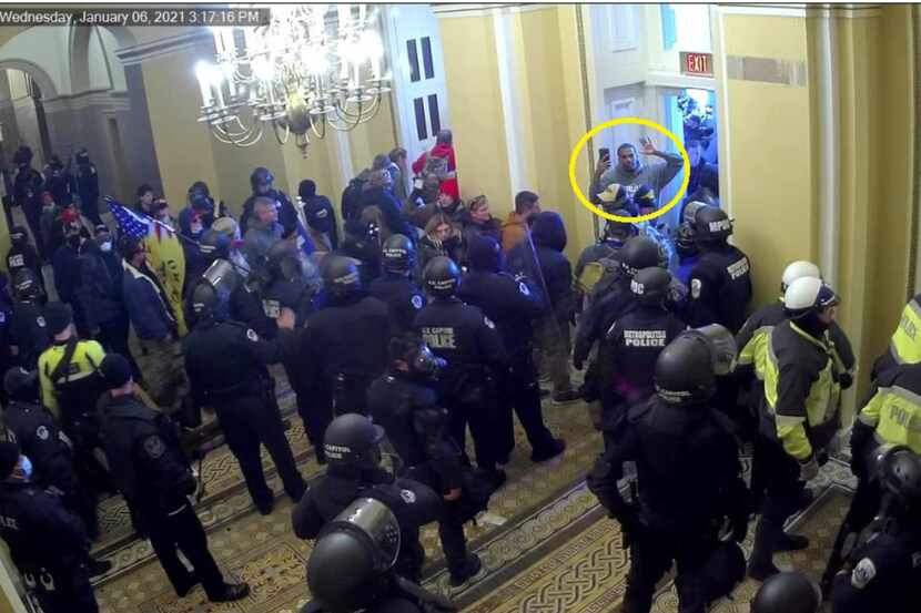 A still image from security video shows Philip Anderson entering the US Capitol during the...