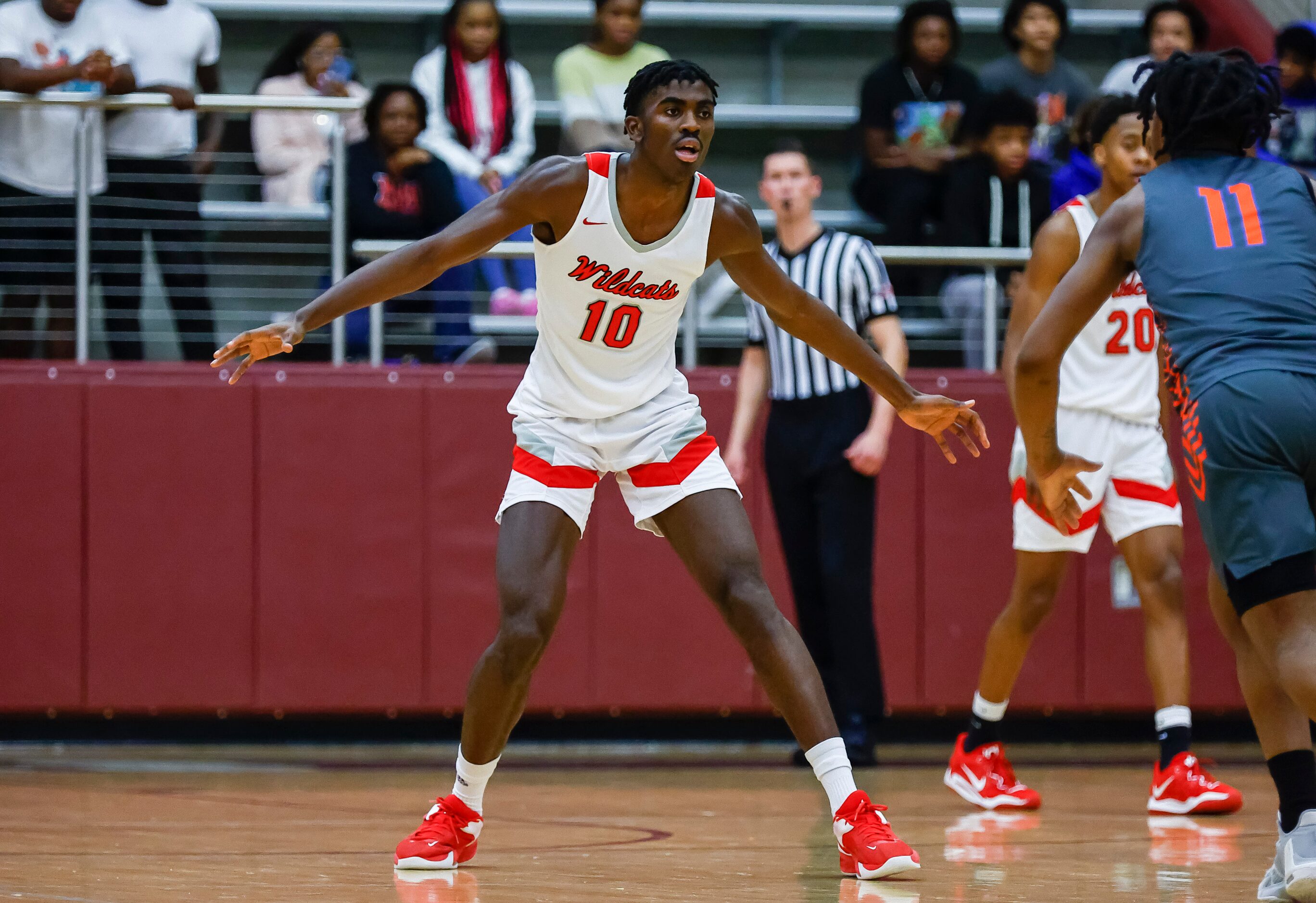 Lake Highlands senior forward Samson Aletan defends during a Class 6A bi-district playoff...