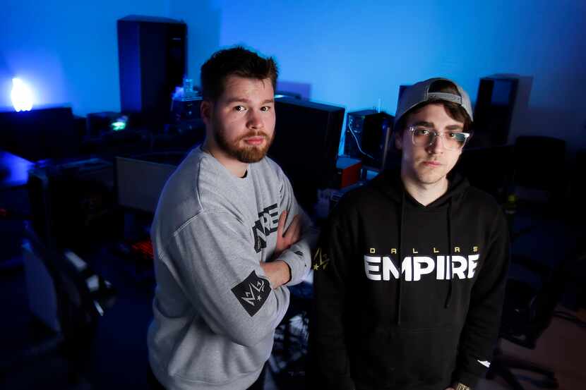 FILE - Dallas Empire players Ian "Crimsix" Porter (left) and James "Clayster" Eubanks pose...