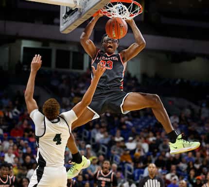 Lancaster's Amari Reed (33) dunks over Killeen Ellison's Prince Hall (4) in the second half...