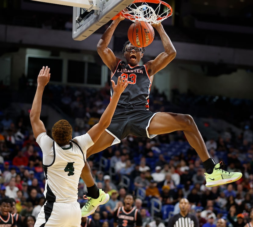 Lancaster's Amari Reed (33) dunks over Killeen Ellison's Prince Hall (4) in the second half...