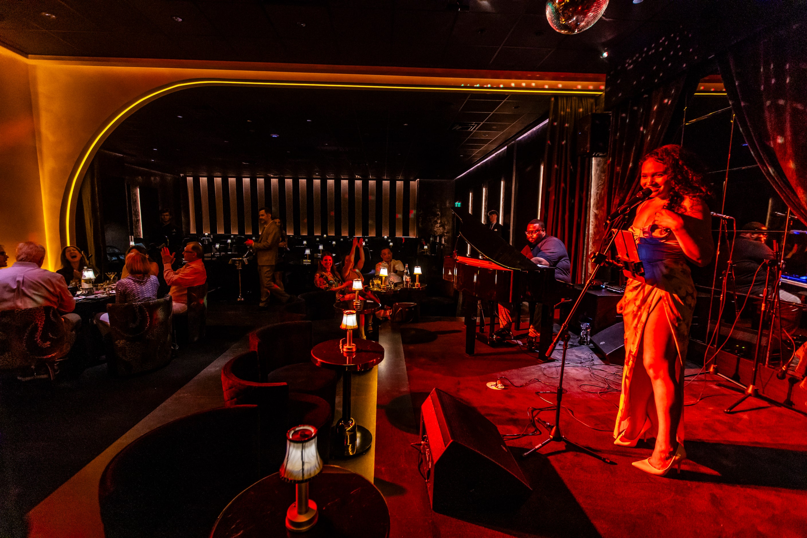 Singer Jamella Sorko and pianist Cris Brenham perform at Regines, a new speakeasy, in...