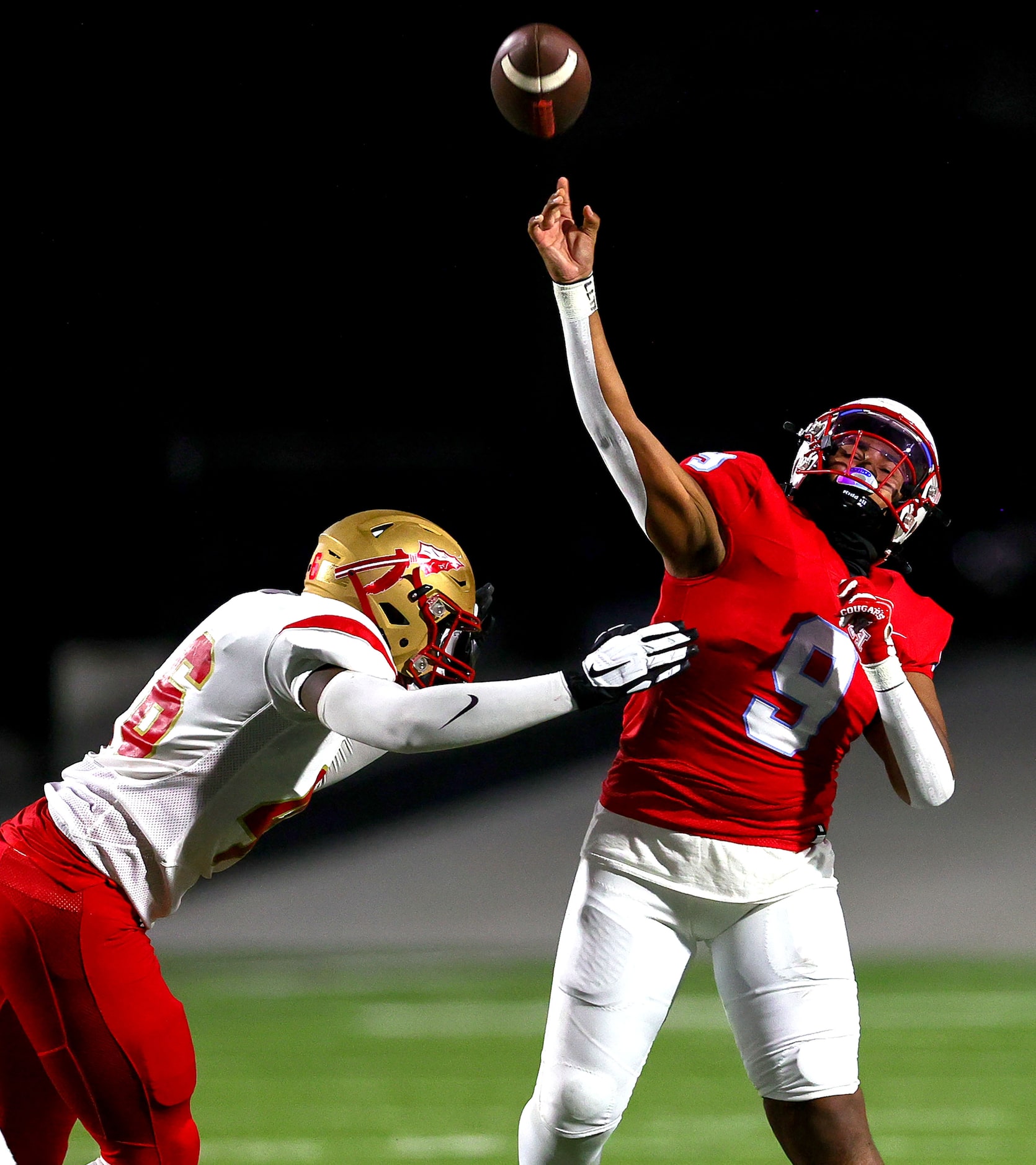 Skyline quarterback Trey Arroyo (9) gets off a pass against South Grand Prairie defensive...