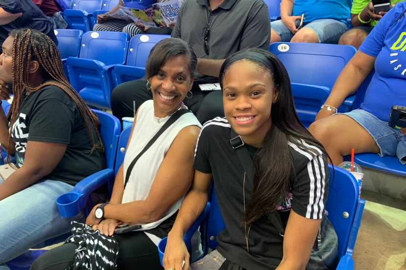 Guard Moriah Jefferson poses alongside her mother for a photo during the Wings 83-77 win...