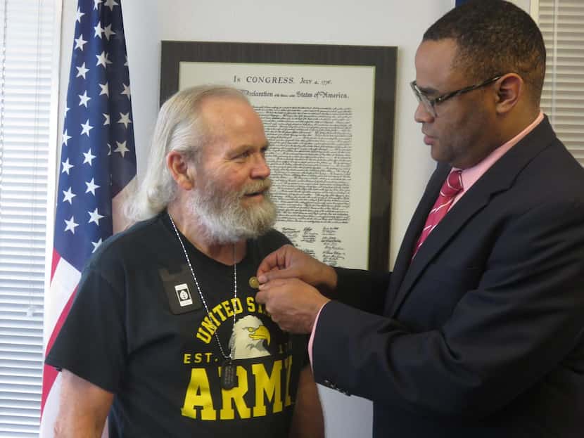 
Rep. Marc Veasey honored Vietnam veteran Michael Killam at his office.
