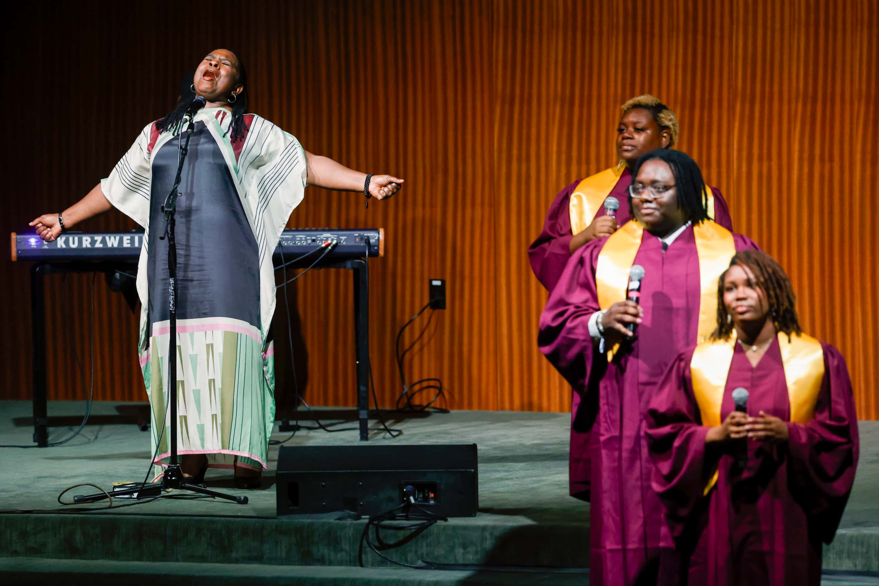 Ruthie Foster (left) performs alongside the Huston-Tillotson University Concert Choir before...