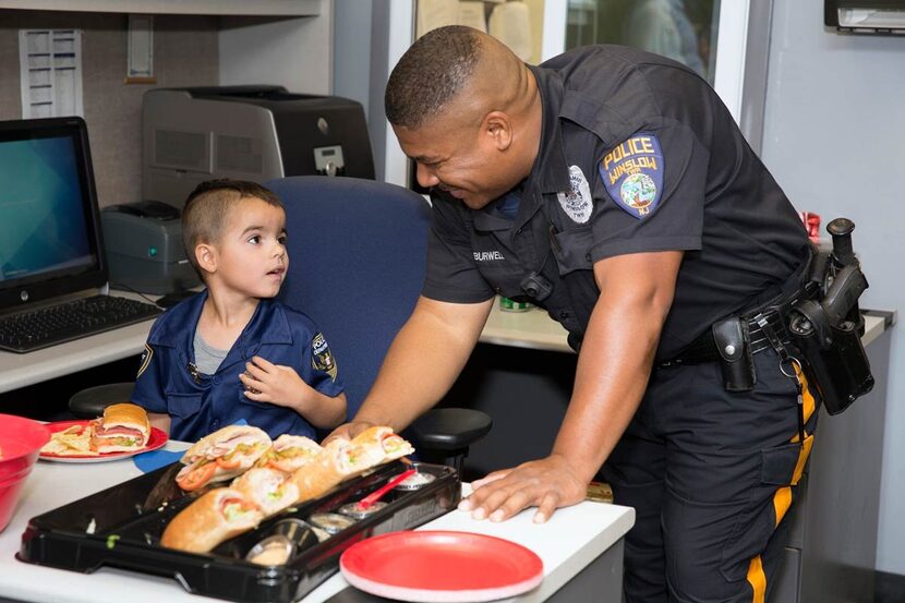 William Evertz Jr. and Officer George Burwell at the Winslow Township police headquarters in...