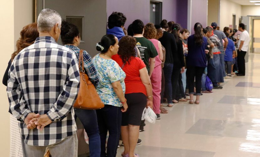  People lined up outside of the business office at Parkland Hospital on Monday, June 15,...