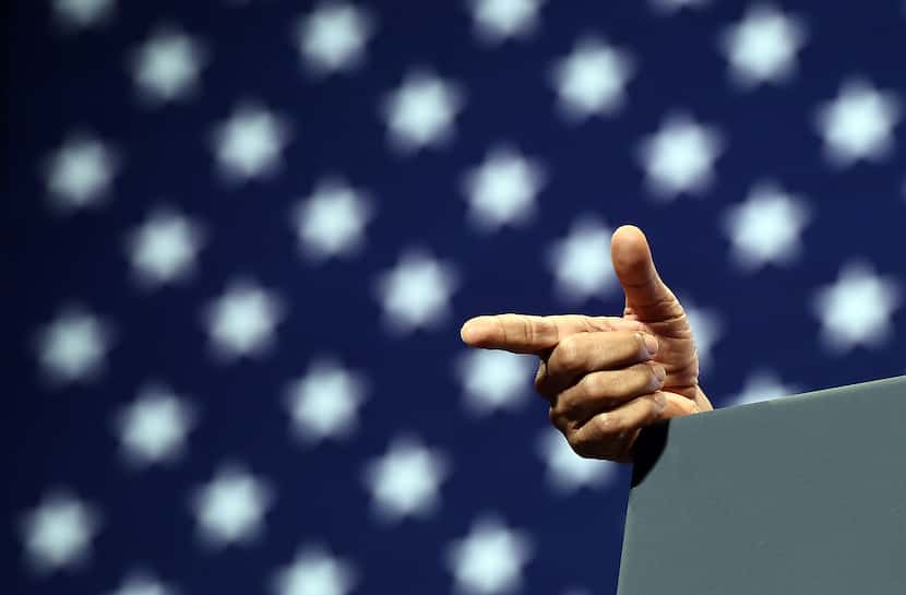  The hand of U.S. President Barack Obama is seen as he gestures while speaking on the...