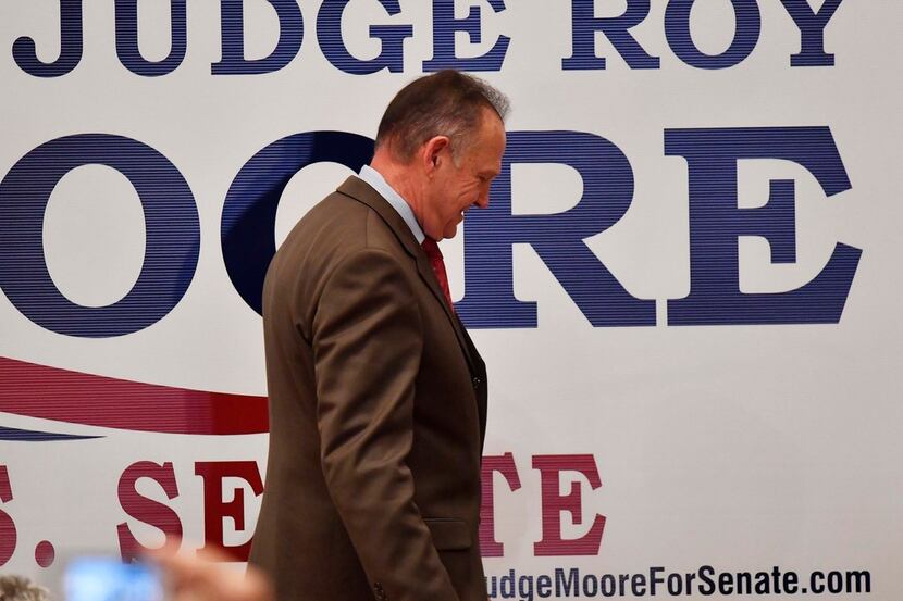 Defeated U.S. Senate candidate Roy Moore left the stage after giving a speech at the end of...