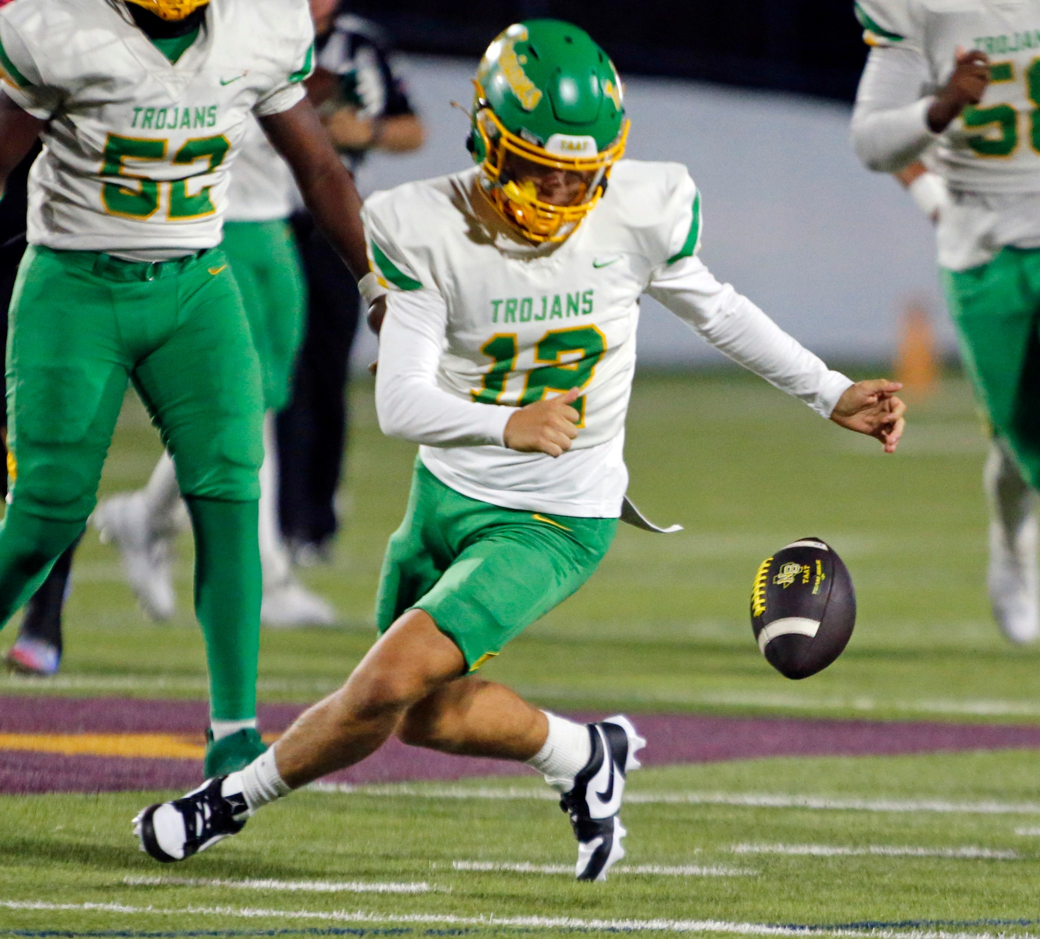 Carrollton Newman Smith High QB Kaden Gonzalez (12) fumbles the football during the first...