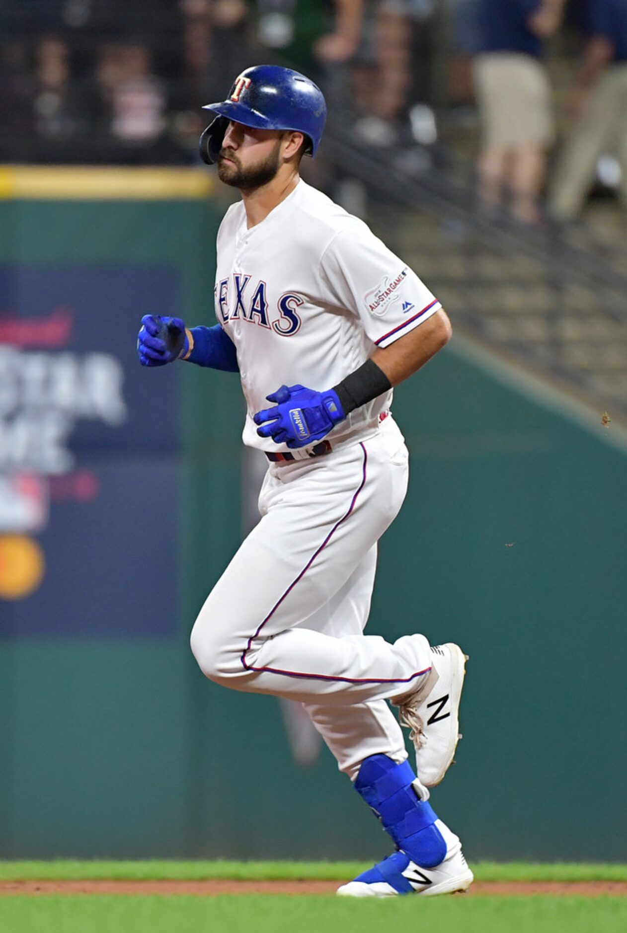 CLEVELAND, OHIO - JULY 09: Joey Gallo #13 of the Texas Rangers and the American League runs...