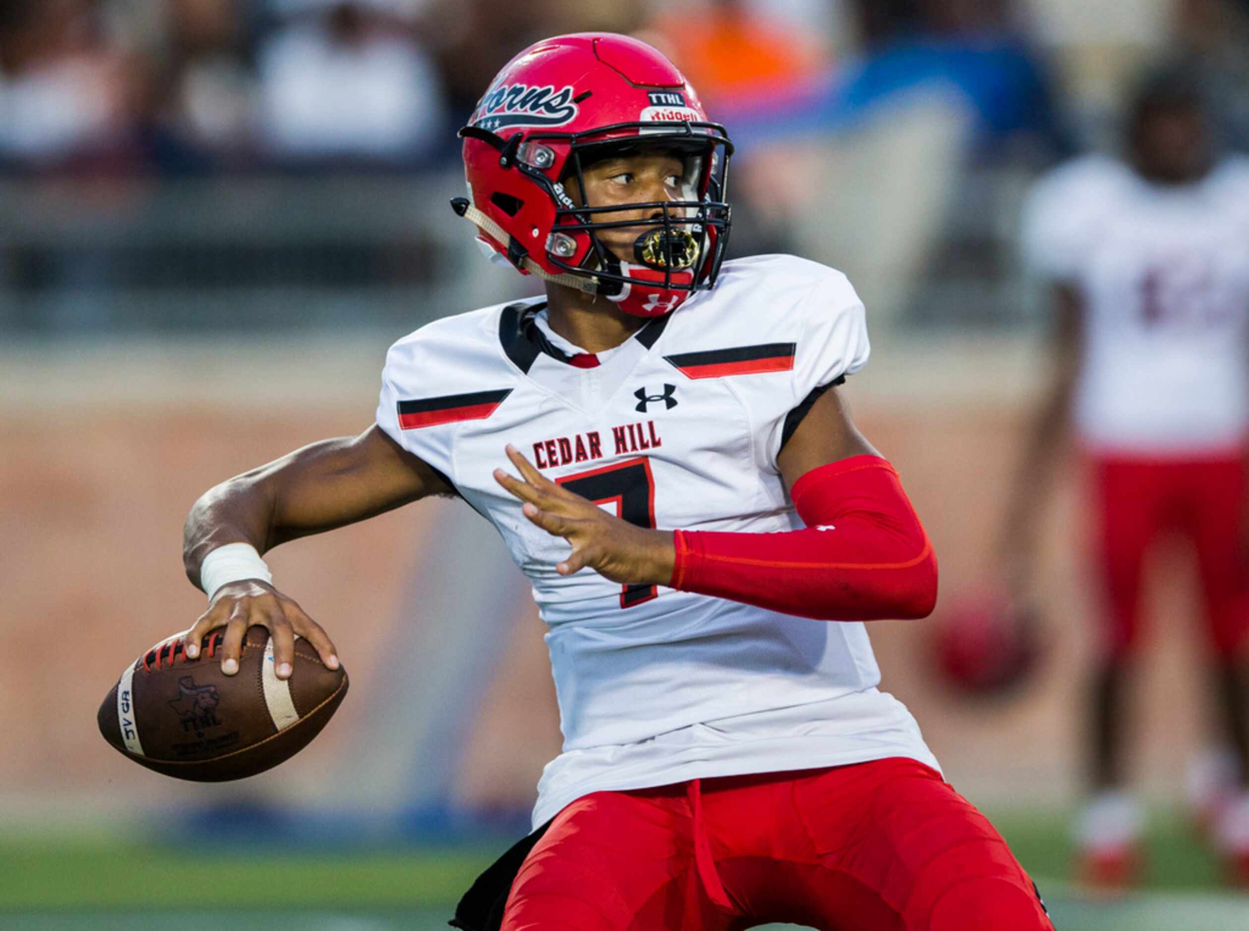 Cedar Hill quarterback Kaidon Salter (7) looks for a receiver during the second quarter of a...