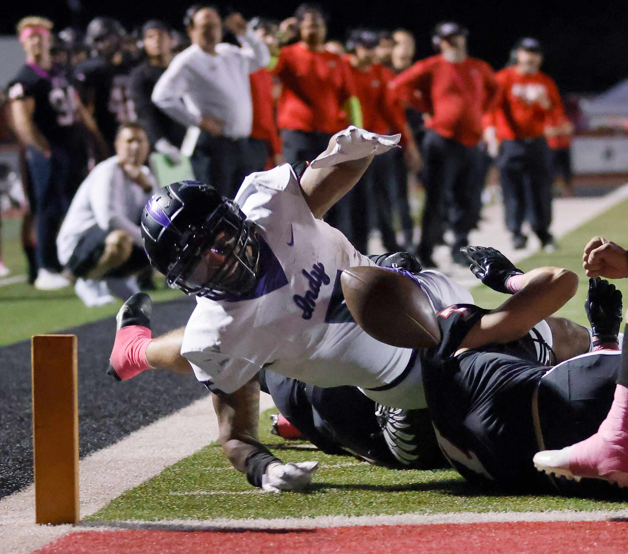 Frisco Independence running back Keith Rockwell (5) fumbles the ball as he stretches for the...