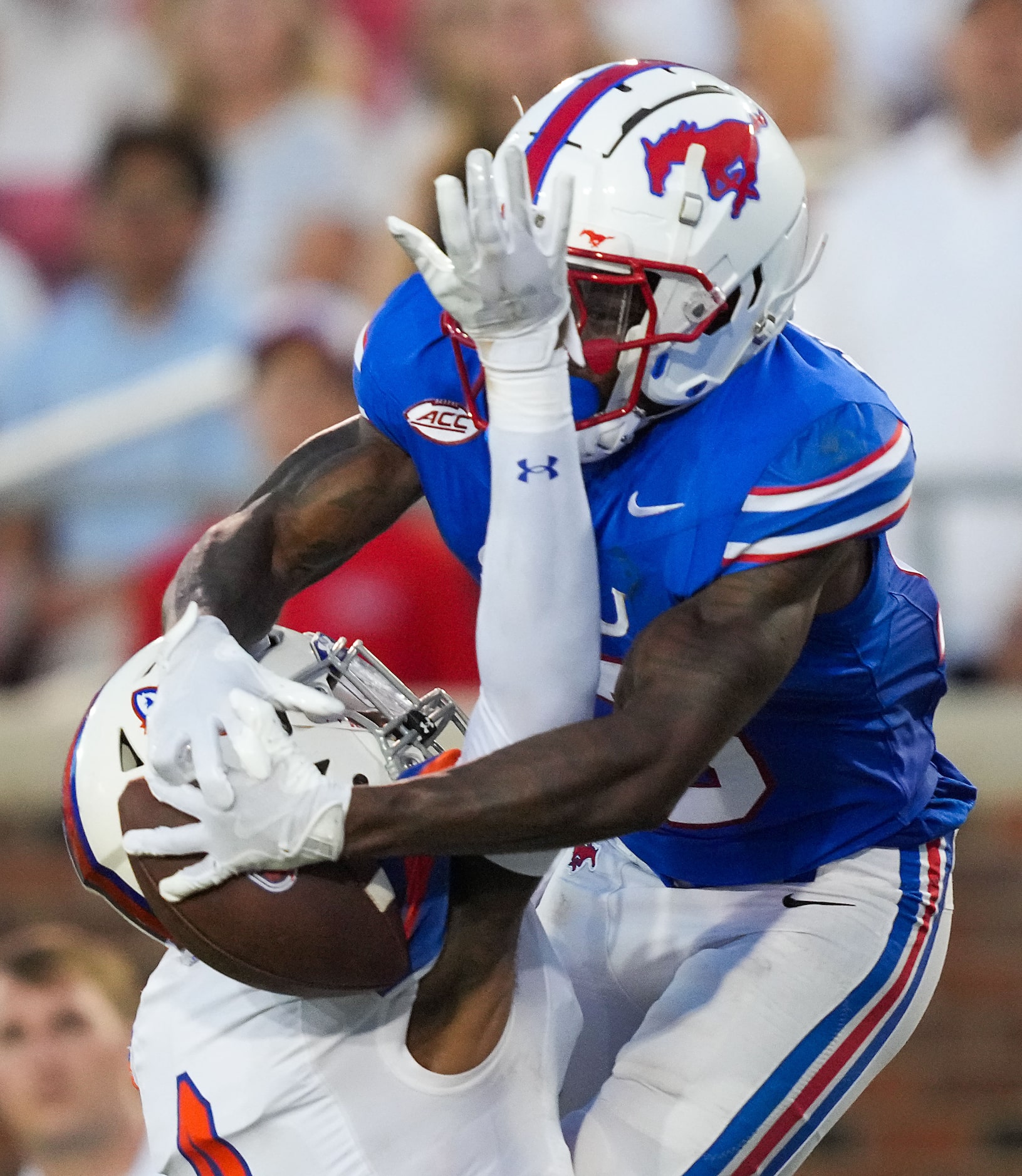 Houston Christian cornerback Ashton Williams (4) breaks up a pass intended for SMU wide...