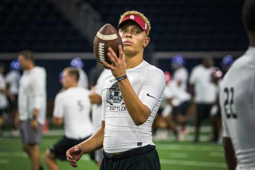 Quarterback Spencer Rattler, of Phoenix, tosses a ball around during the second day of The...