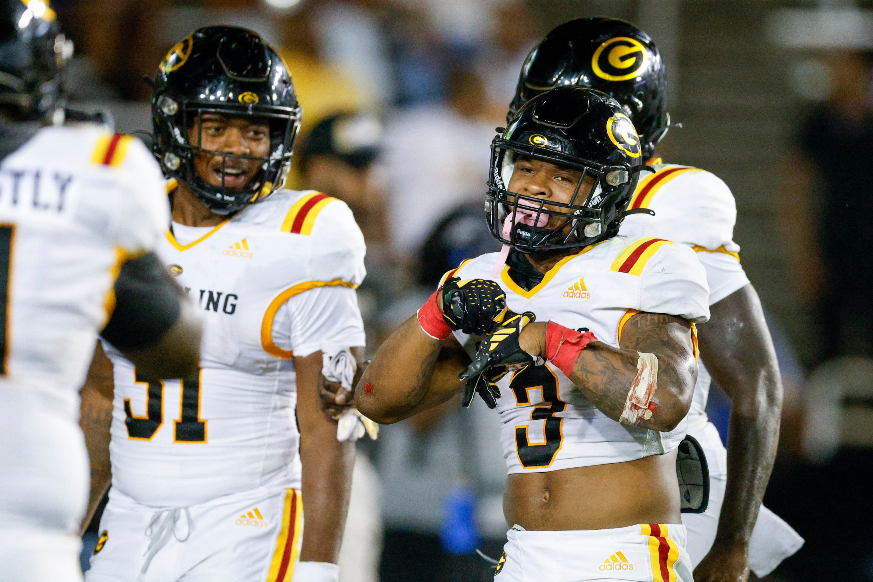 Grambling State running back Floyd Chalk IV (3) celebrates his rushing touchdown with...