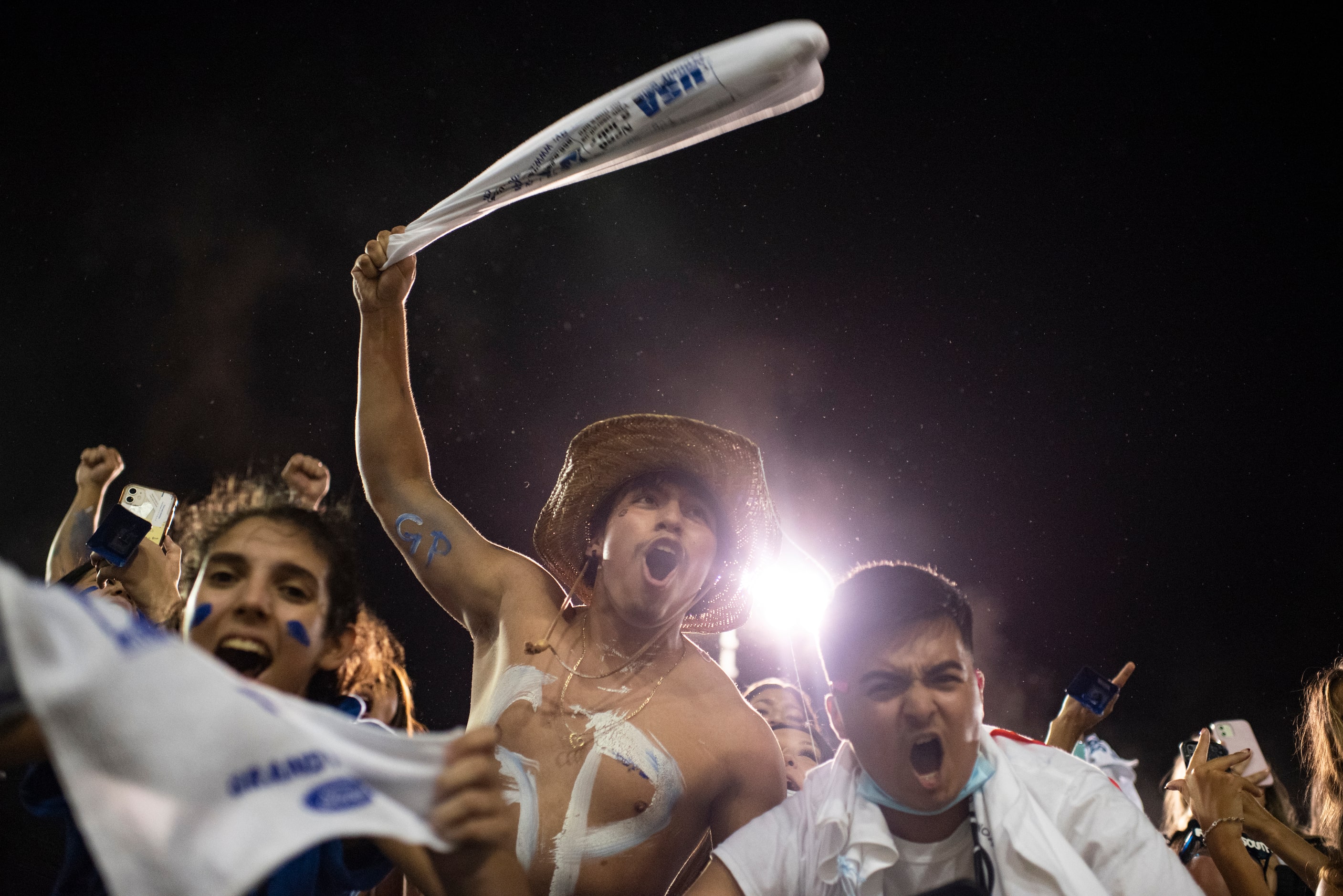 The Grand Prairie student section cheers at the conclusion of their game against South Grand...