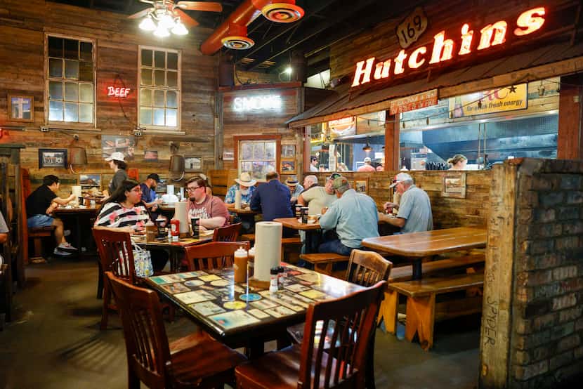 People dine for lunch at Hutchins BBQ, Friday, July 28, 2023 in Frisco, Texas.