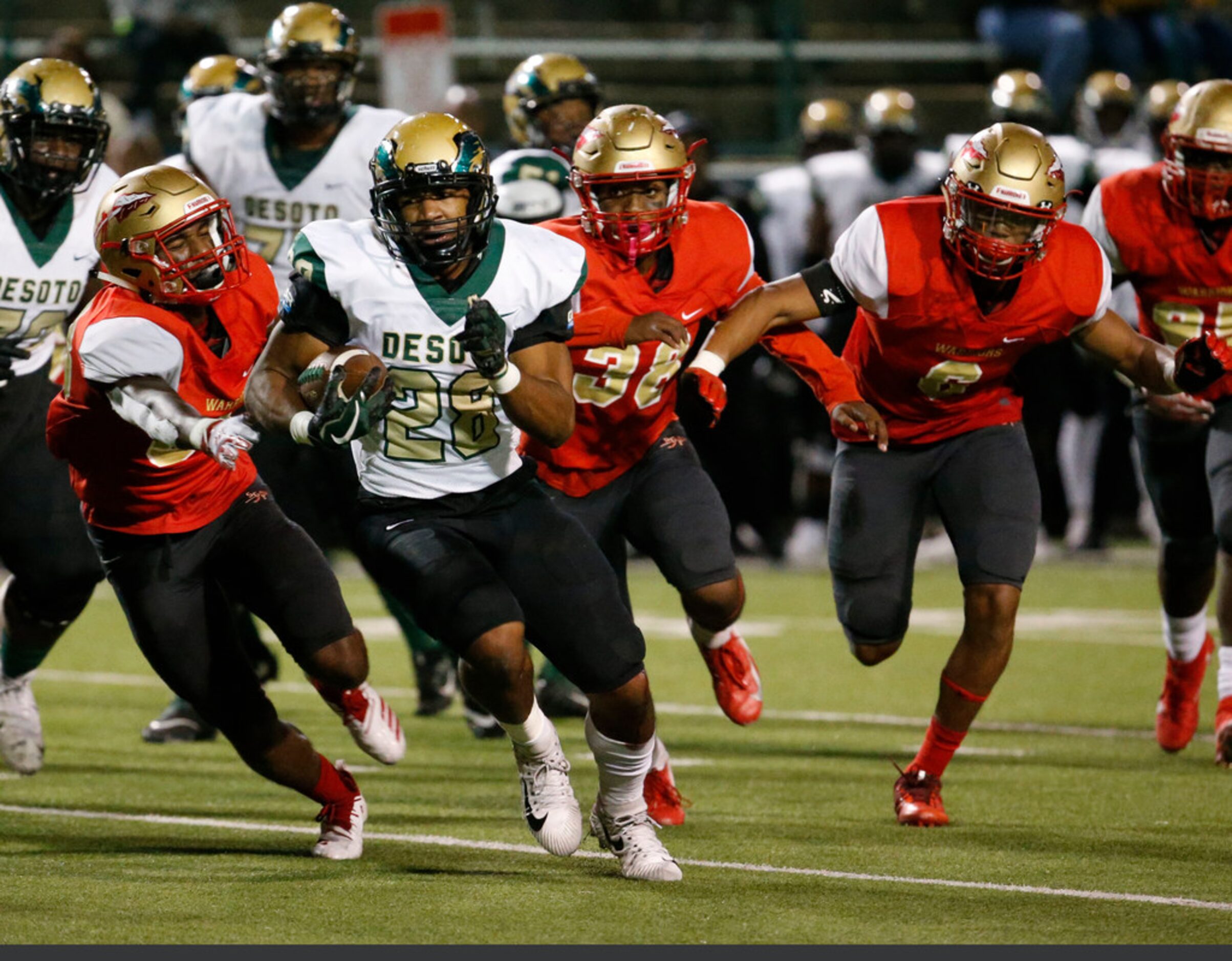 Desoto's Roston White runs the ball in for a touchdown against South Grand Prairie during...