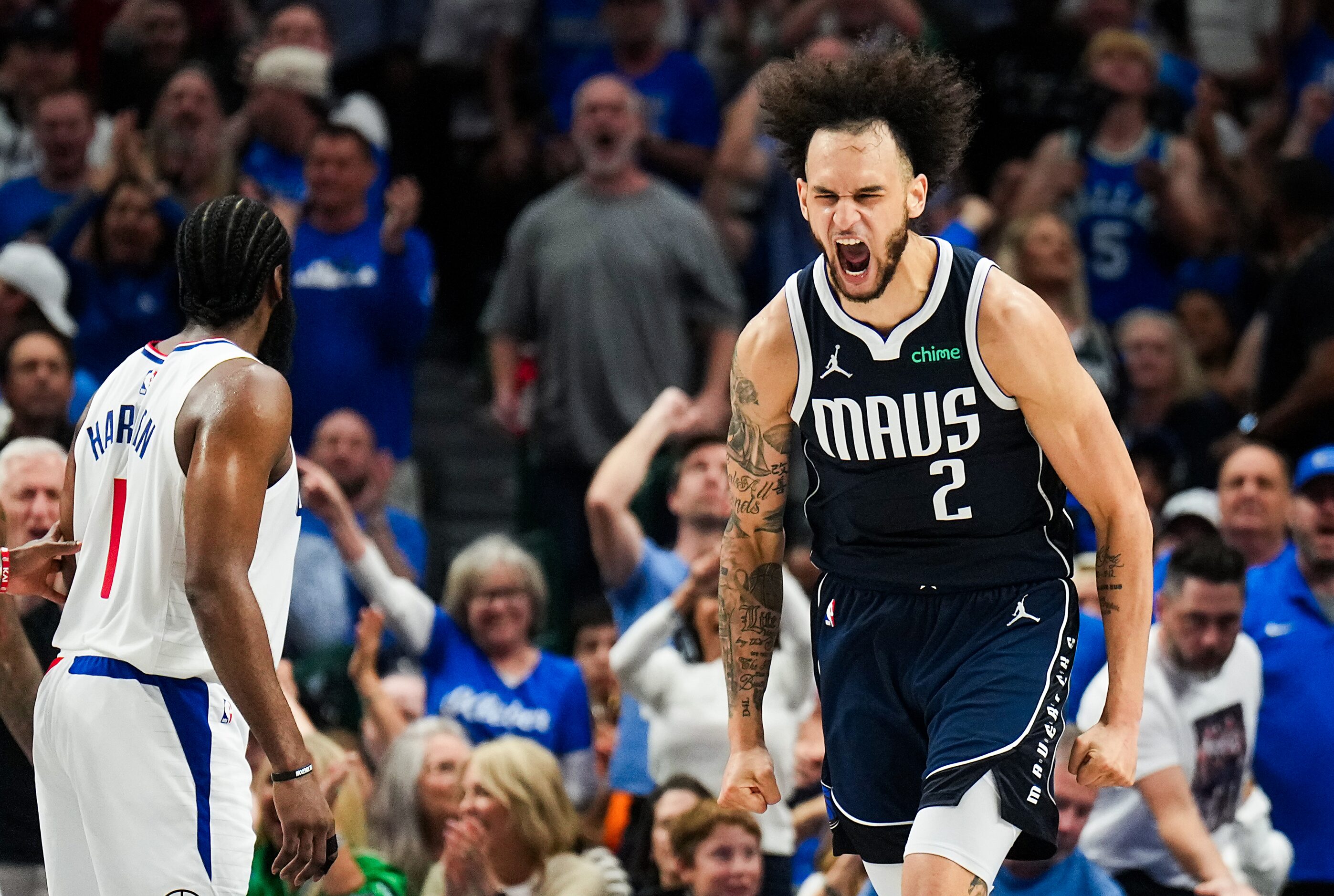 Dallas Mavericks center Dereck Lively II (2) celebrates after a basket during the first half...