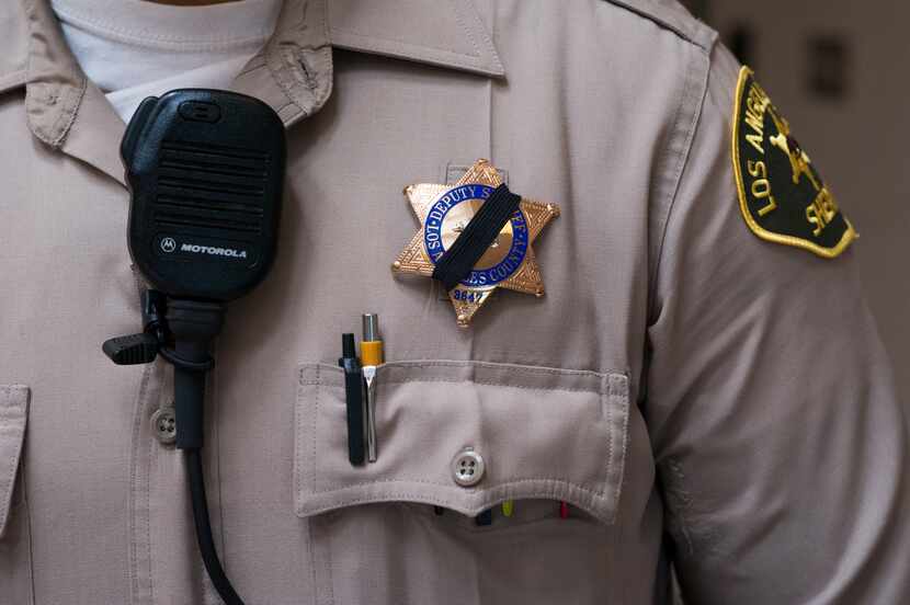 A Los Angeles Sheriff's Department deputy honored slain officer Lorne Ahrens, a veteran of...