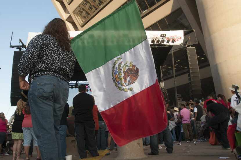 A Mexican flag was displayed during Fiesta Dallas at City Hall Plaza on May 4, 2013.