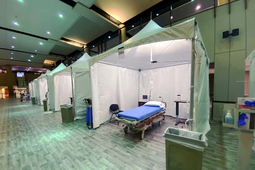 Texas Health Plano has set up emergency tents in its lobby to help treat patients amid an...