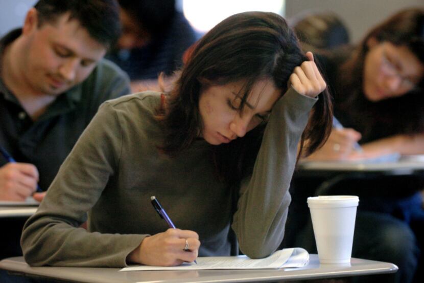 A student concentrates during her U.S. History final exam at El Centro College in Dallas.